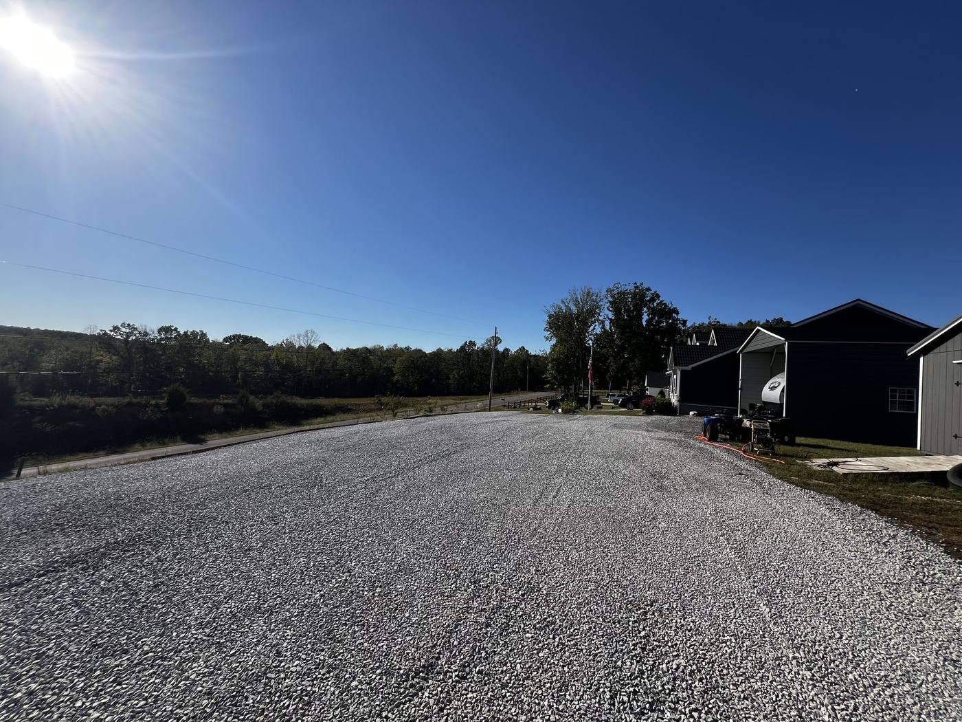 Newly installed gravel driveway and parking area by Michael Way Acres